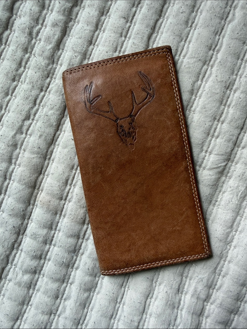 Distressed Leather Long Wallet with Embossed Stag